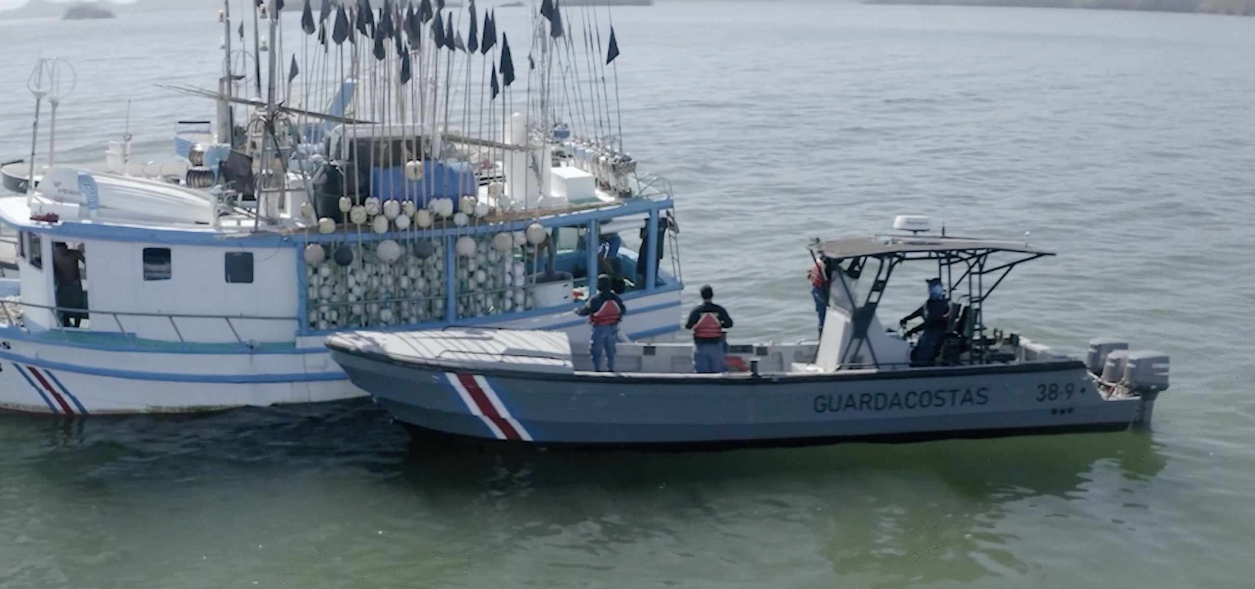 Guardacostas boat approaching a fishing boat