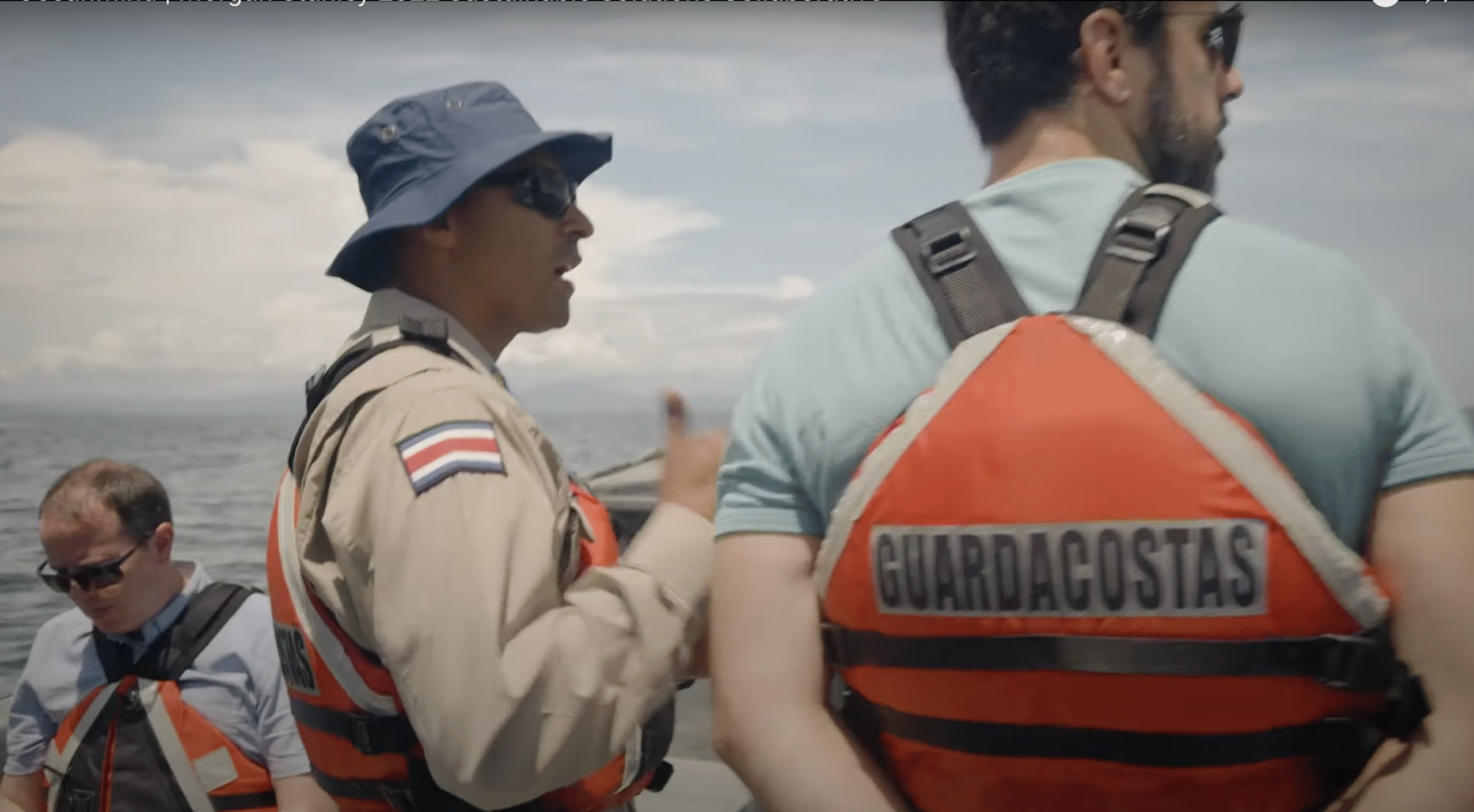Guardacostas crew looking out from a boat