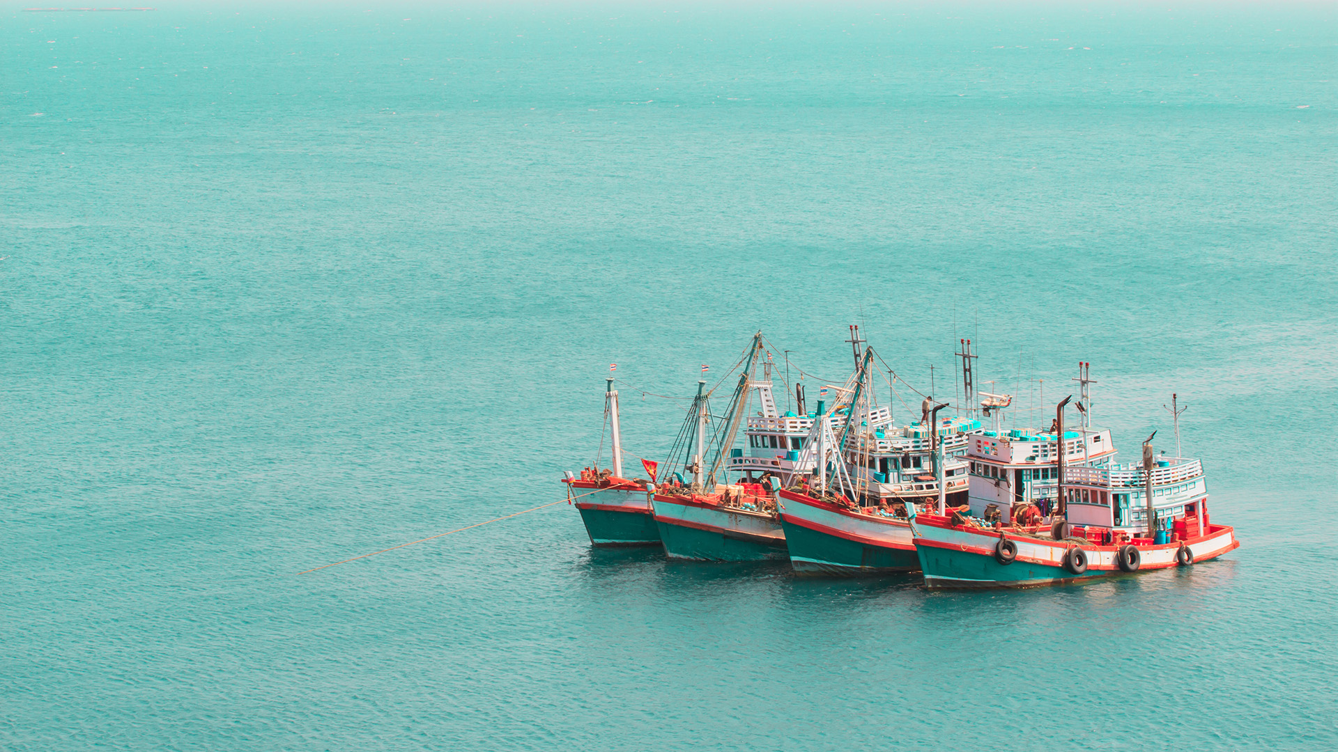 A fleet of Thai fishing boats in the Andaman Sea
