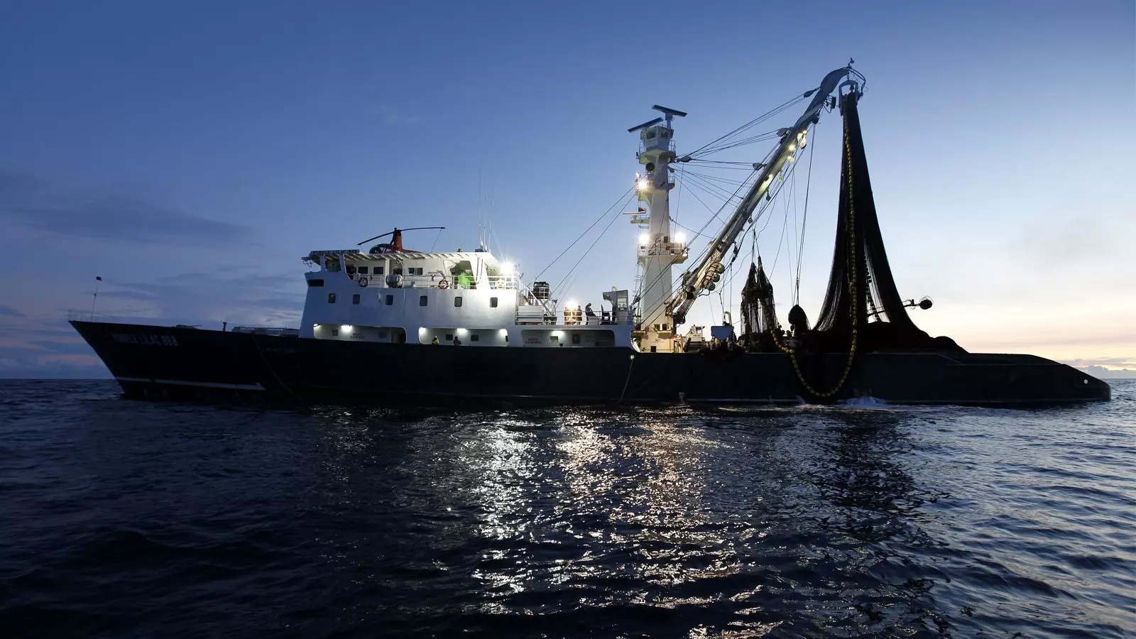 Commercial fishing boat at dusk