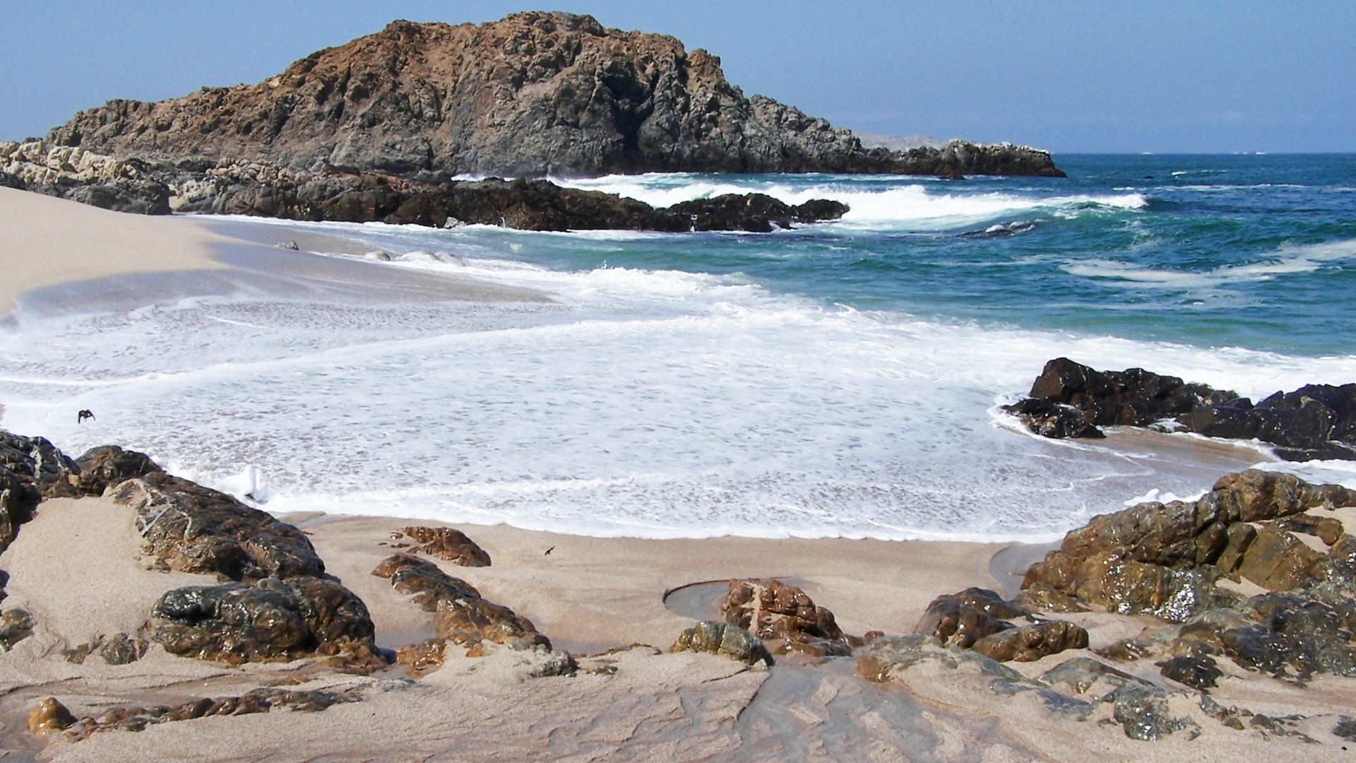 Beach with rocks and waves